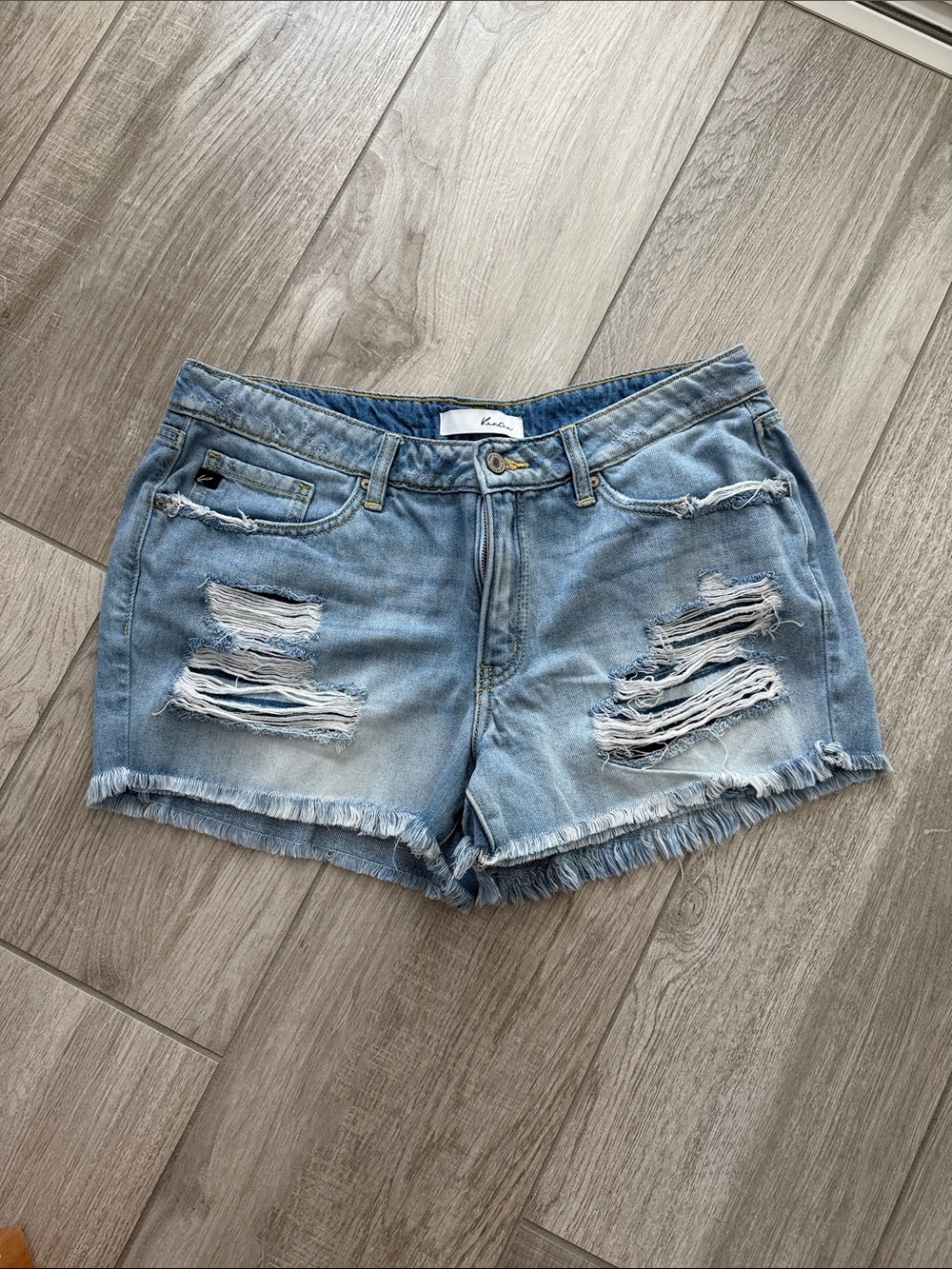 KanCan Light Blue Distressed Denim Shorts with Frayed Hem